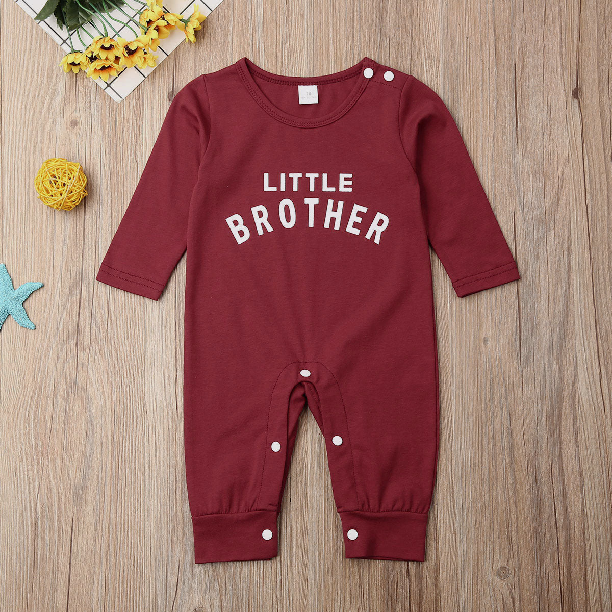 Soft cotton baby romper with “Little Brother” print – gender neutral, breathable and perfect for playtime or gifting.