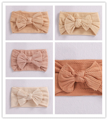 Add a stylish touch to your baby’s look with our soft, stretchy nylon bow headband. Gentle, comfortable, and perfect for everyday wear or special occasions