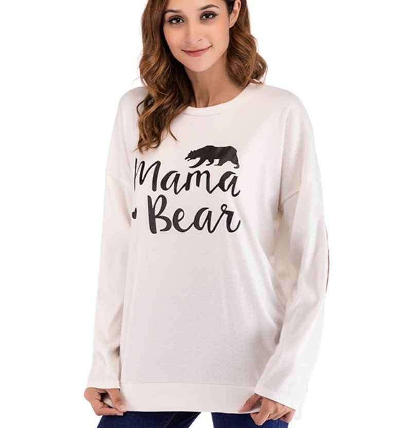Stay comfy & stylish with this Mama Bear maternity top! A must-have for expecting & new mums, featuring soft fabric, elbow patches & a relaxed fit.