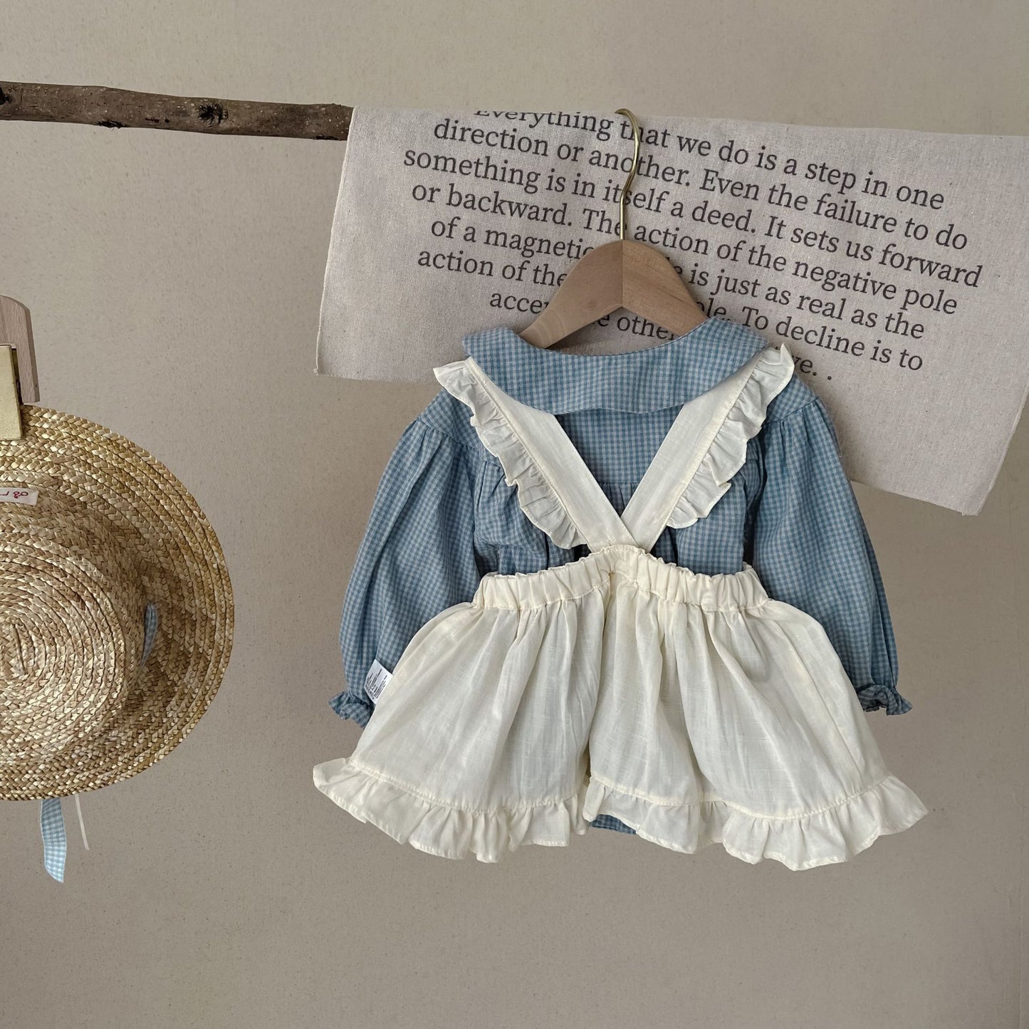 Dress your little one in timeless charm with this Vintage Plaid Romper & Ruffle Pinafore Set. Soft cotton, delicate ruffles & a classic doll collar design