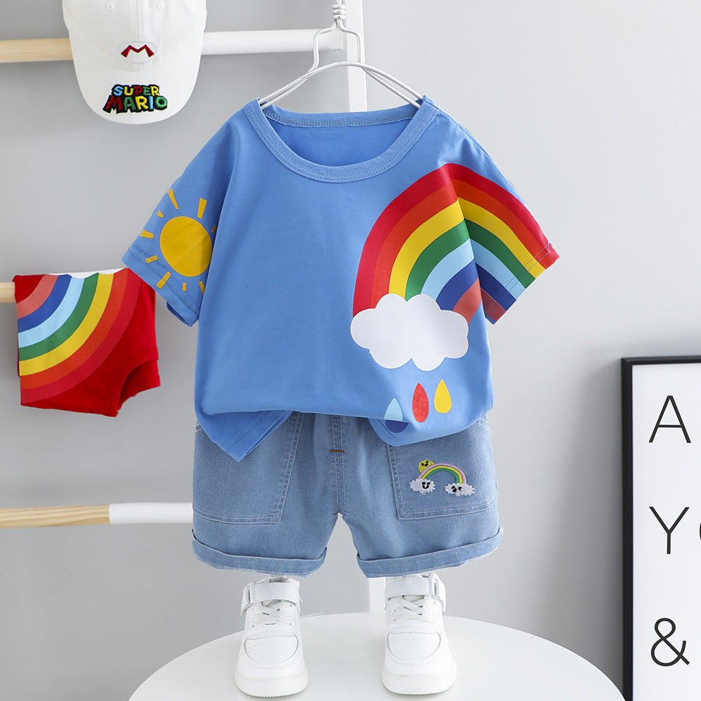 Make summer magical with the Rainbow Dreams Summer Set! Soft cotton tee with a playful rainbow print and comfy denim shorts for a stylish, fun look.