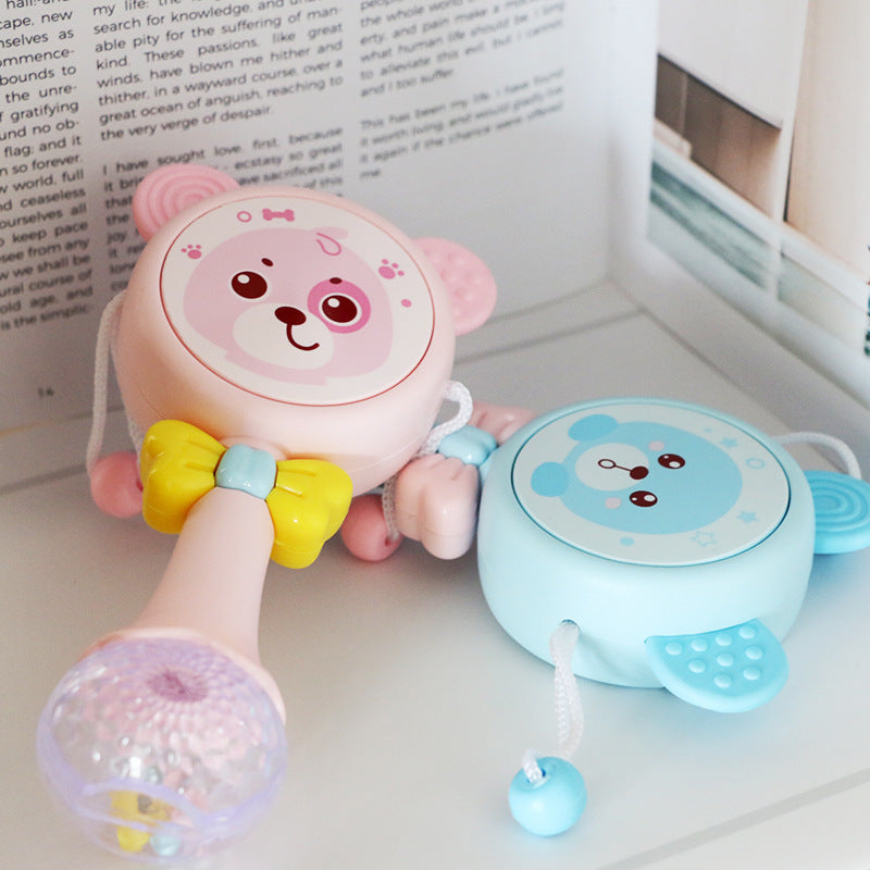 The perfect 2-in-1 baby rattle and teething toy! Engages little ones with music, soft silicone teething relief, and interactive play. Available in blue & pink.