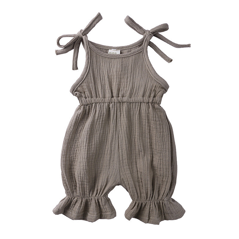 Discover the perfect summer romper for your little one! Made from 100% breathable muslin cotton, featuring delicate ruffles and adjustable tie straps. Perfect for playdates & special moments!