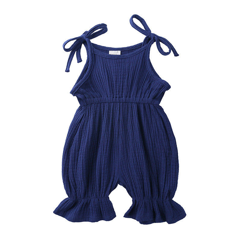Discover the perfect summer romper for your little one! Made from 100% breathable muslin cotton, featuring delicate ruffles and adjustable tie straps. Perfect for playdates & special moments!