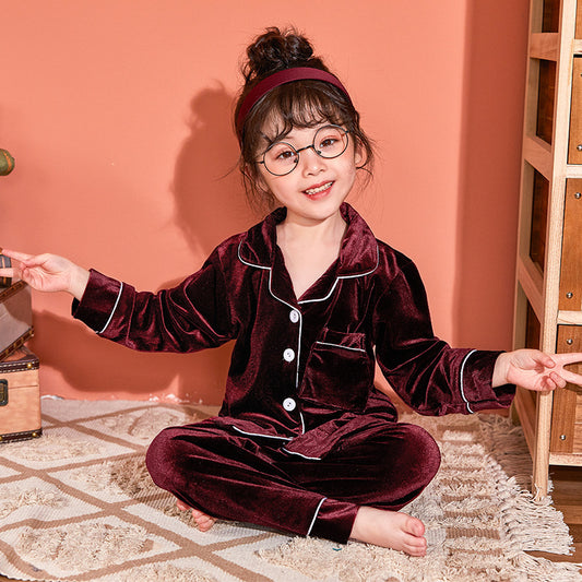 Elevate your child’s bedtime routine with our ultra-soft velvet pyjama set. Featuring breathable fabric, classic piping details, and a cozy fit. Perfect for stylish sleepwear!