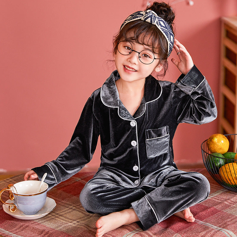 Elevate your child’s bedtime routine with our ultra-soft velvet pyjama set. Featuring breathable fabric, classic piping details, and a cozy fit. Perfect for stylish sleepwear!
