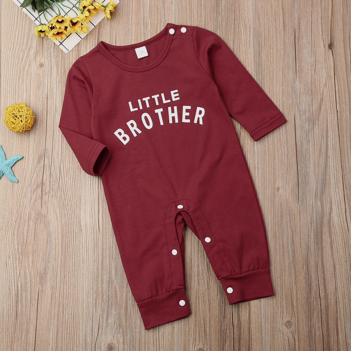 Soft cotton baby romper with “Little Brother” print – gender neutral, breathable and perfect for playtime or gifting.