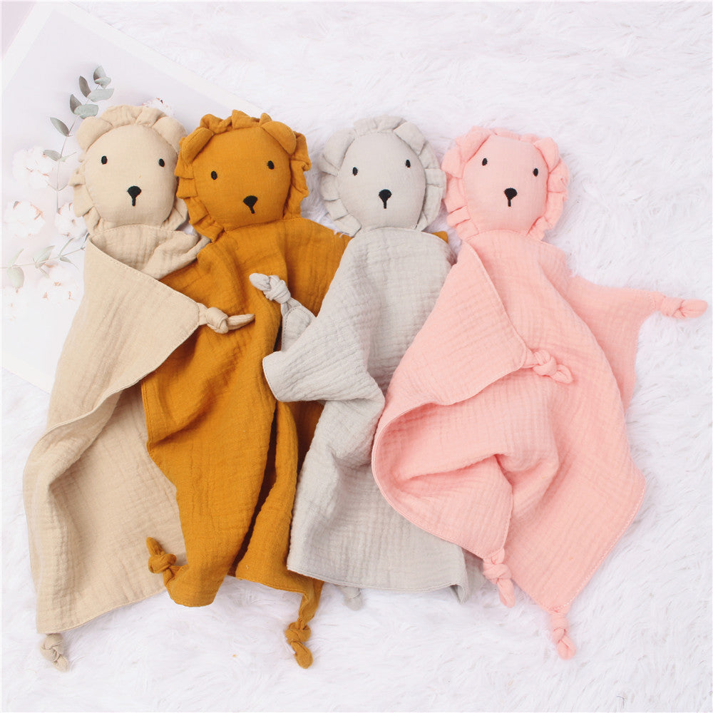 Soft & soothing lion comfort towel for babies – made with breathable cotton gauze for snuggly naps and sensory security.