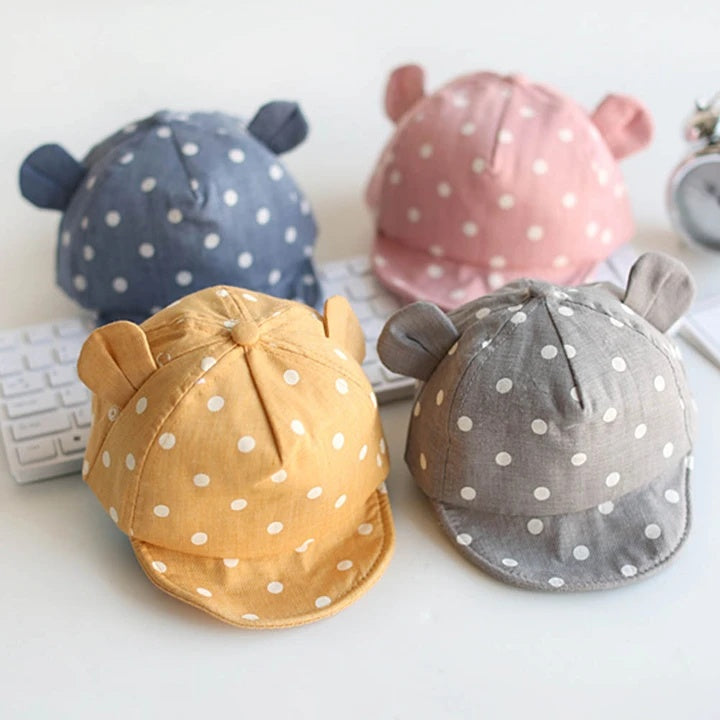 Keep your baby cool & protected with this adorable sun hat! Adjustable fit, breathable cotton & cute bear ears for ultimate style & comfort.