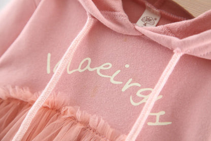 Discover the perfect mix of cozy and chic! This adorable hoodie dress features a soft cotton top with a layered tulle skirt. Perfect for playdates & outings!