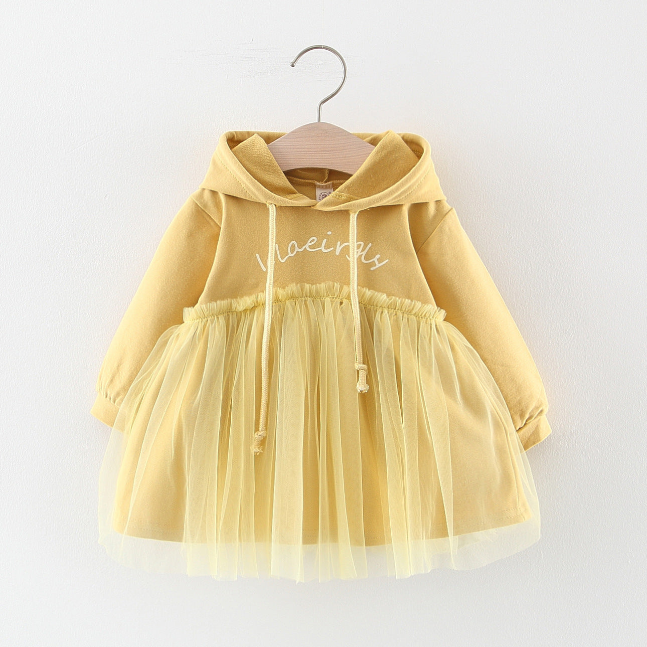 Discover the perfect mix of cozy and chic! This adorable hoodie dress features a soft cotton top with a layered tulle skirt. Perfect for playdates & outings!