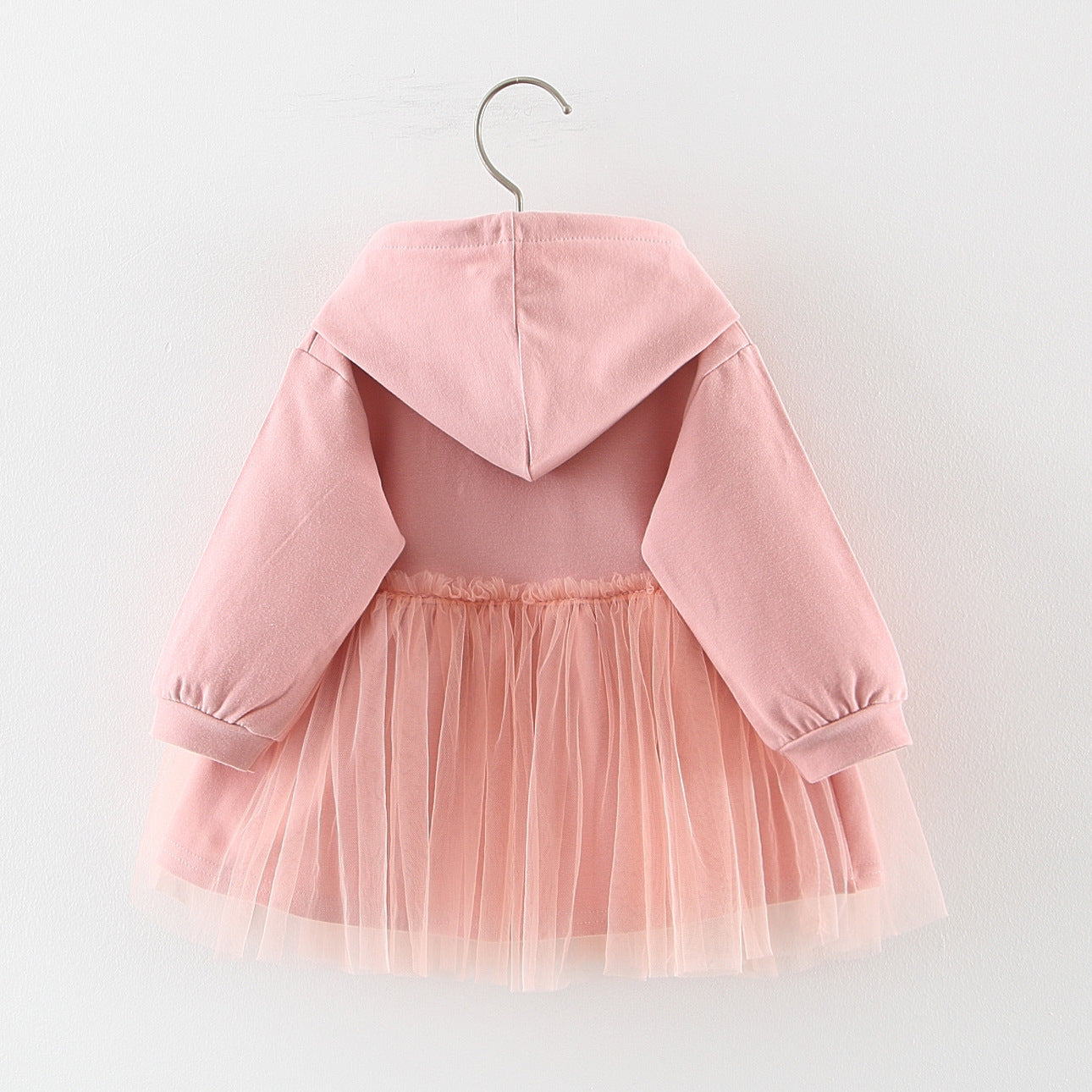 Discover the perfect mix of cozy and chic! This adorable hoodie dress features a soft cotton top with a layered tulle skirt. Perfect for playdates & outings!