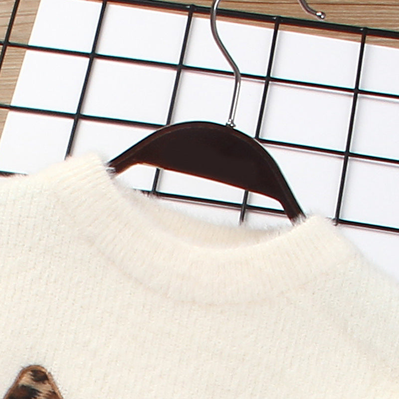 Dress your little one in luxury with our cozy Leopard Knitted Sweater & Skirt Set. A high-end, fashion-forward toddler outfit perfect for autumn & winter