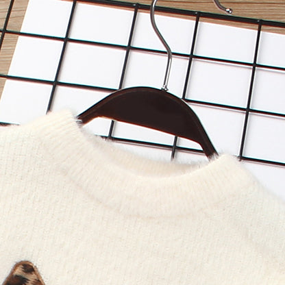 Dress your little one in luxury with our cozy Leopard Knitted Sweater & Skirt Set. A high-end, fashion-forward toddler outfit perfect for autumn & winter