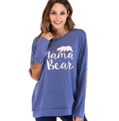 Stay comfy & stylish with this Mama Bear maternity top! A must-have for expecting & new mums, featuring soft fabric, elbow patches & a relaxed fit.