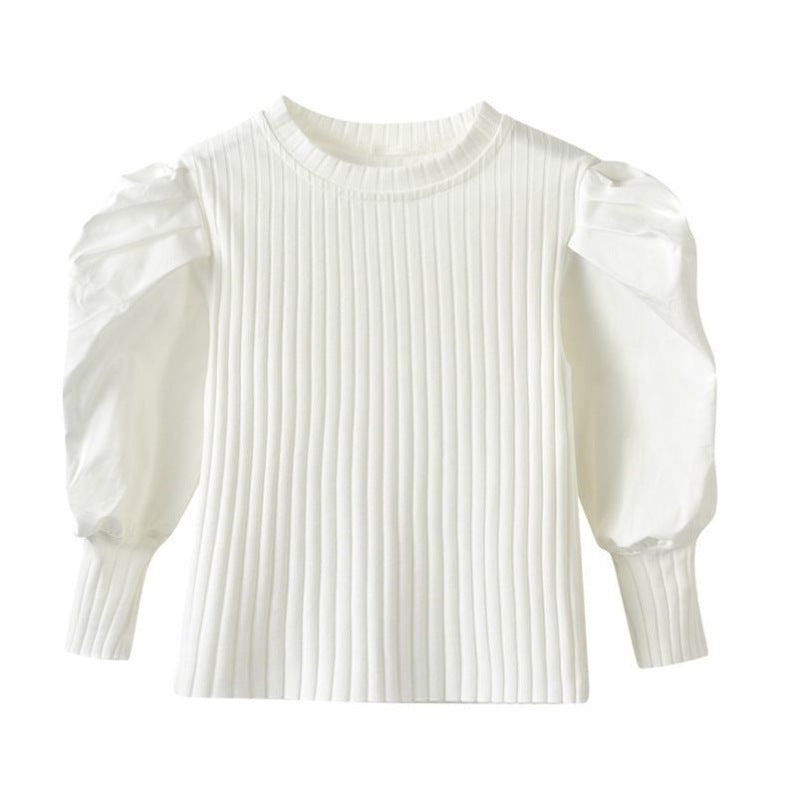 A chic and stylish puff sleeve top for girls! Made from soft, breathable cotton, this trendy top is perfect for everyday wear, playdates, or special occasions. Available in white & black.