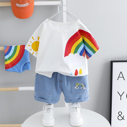 Make summer magical with the Rainbow Dreams Summer Set! Soft cotton tee with a playful rainbow print and comfy denim shorts for a stylish, fun look.