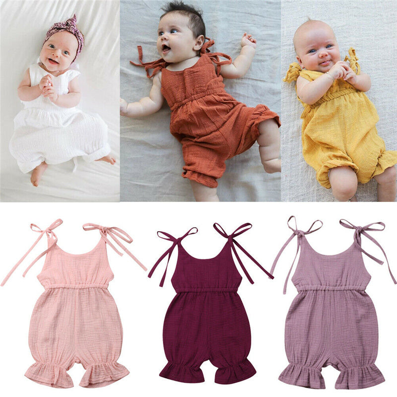 Discover the perfect summer romper for your little one! Made from 100% breathable muslin cotton, featuring delicate ruffles and adjustable tie straps. Perfect for playdates & special moments!
