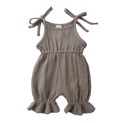 Discover the perfect summer romper for your little one! Made from 100% breathable muslin cotton, featuring delicate ruffles and adjustable tie straps. Perfect for playdates & special moments!