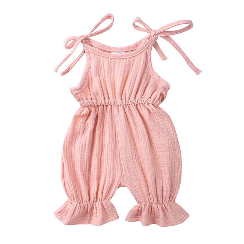 Discover the perfect summer romper for your little one! Made from 100% breathable muslin cotton, featuring delicate ruffles and adjustable tie straps. Perfect for playdates & special moments!