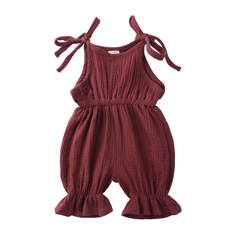 Discover the perfect summer romper for your little one! Made from 100% breathable muslin cotton, featuring delicate ruffles and adjustable tie straps. Perfect for playdates & special moments!