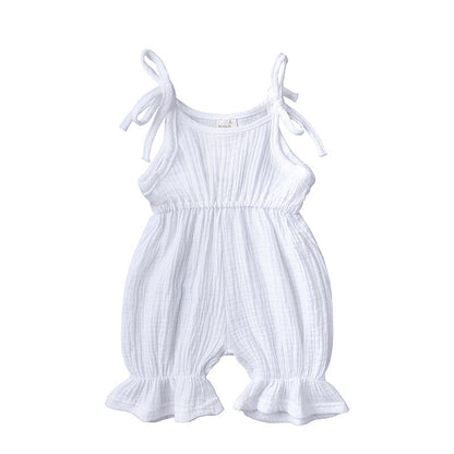 Discover the perfect summer romper for your little one! Made from 100% breathable muslin cotton, featuring delicate ruffles and adjustable tie straps. Perfect for playdates & special moments!