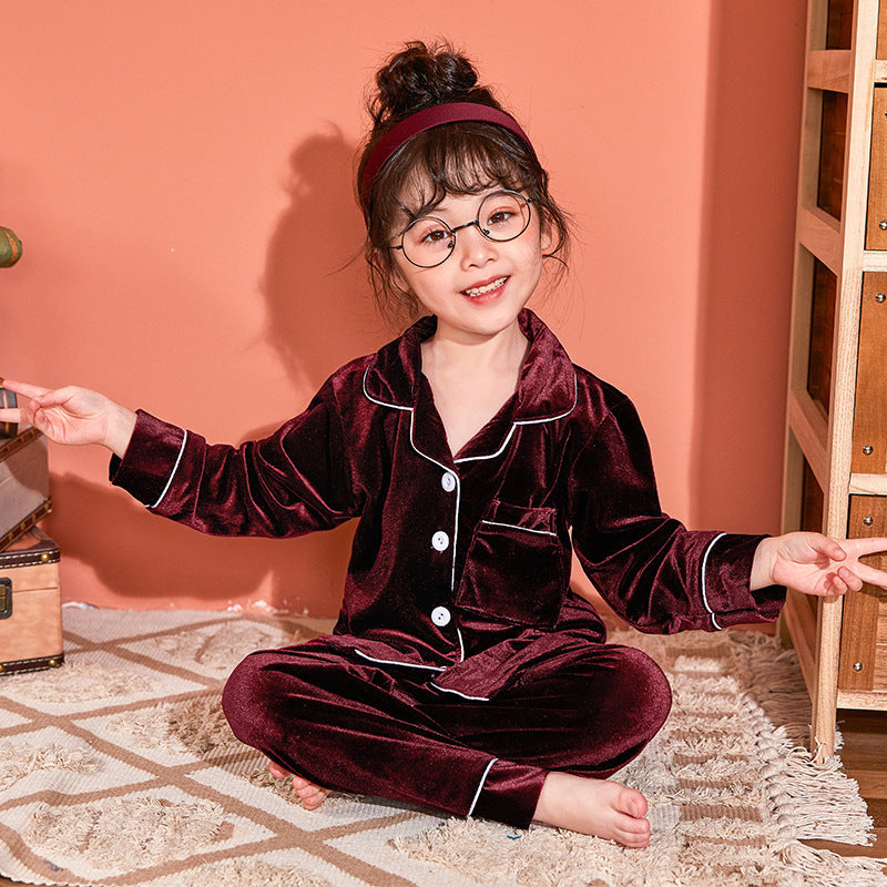 Elevate your child’s bedtime routine with our ultra-soft velvet pyjama set. Featuring breathable fabric, classic piping details, and a cozy fit. Perfect for stylish sleepwear!